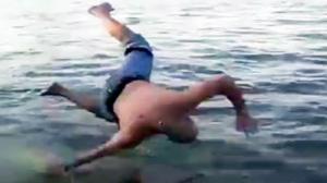 Watch Dude Faceplants Attempting Going Into River Video
