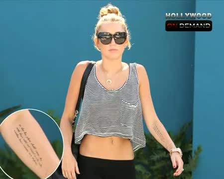 Watch Miley Cyrus Gets A New Tattoo Video