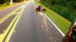 Watch Biker Surfs Out Crash On Top Of His Motorcycle Video