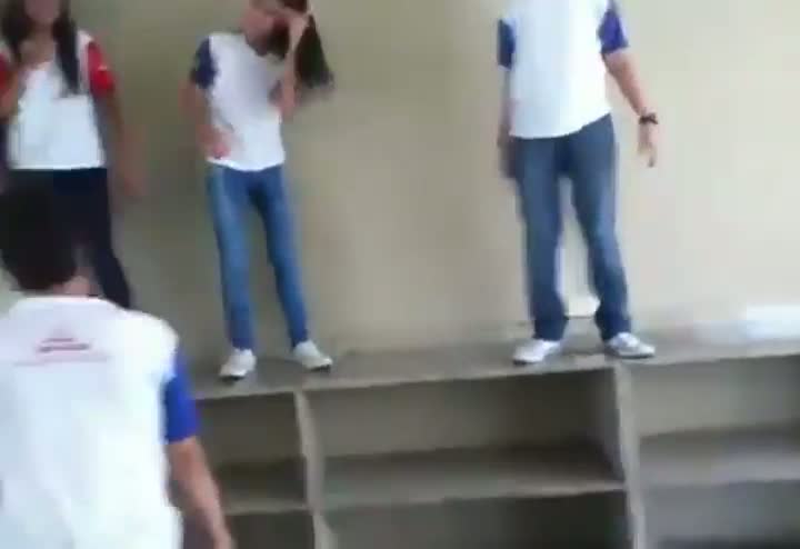 Watch Weird Kid Jumps Through Ceiling With His Head Video