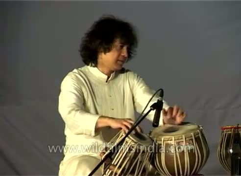 Watch Tabla drum rhythm from India: Zakir Hussain Video