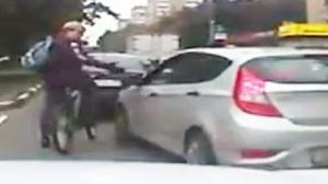 Watch Bike Rider Takes Revenge On Rude Driver Video