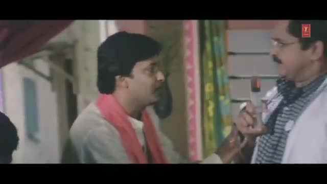 Watch Comedy Scene from Bhojpuri Movie "Maai Ke Charana Mein Charon Dhaam" Video