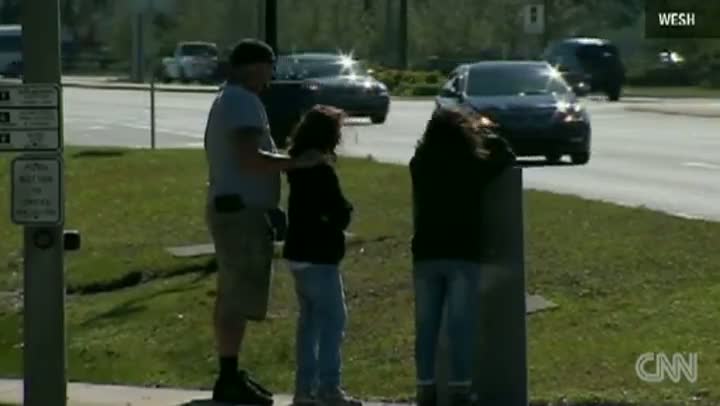 Watch Parents Publicly Shame Girl With Sign Video