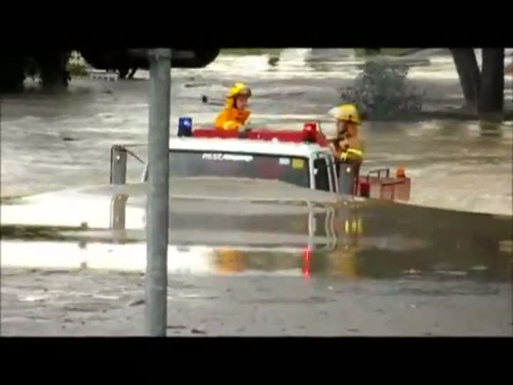 Watch Fire Truck Drives Through Flood Video