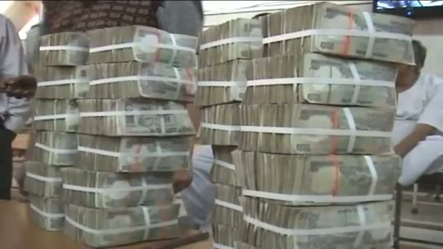 Watch Rupee up 14 paise against dollar in early trade Video