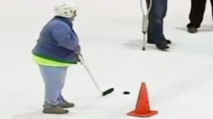 Watch 59 Yr Old Wins Truck With Lucky Shot at a Hockey Game Video