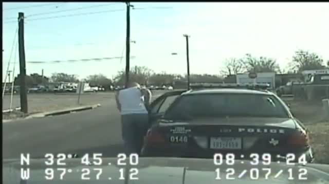Watch Handcuffed Suspect Steals Police Car in Texas Video