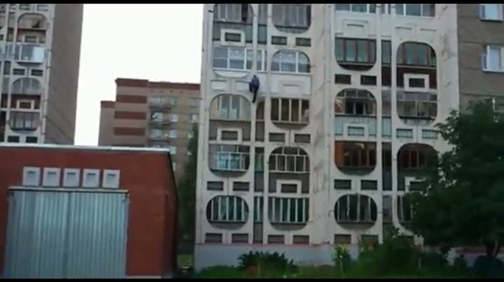 Watch Drunk Guy Falls Off Building Video