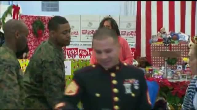 Watch Raw - Michelle Obama Helps With Toys for Tots Video