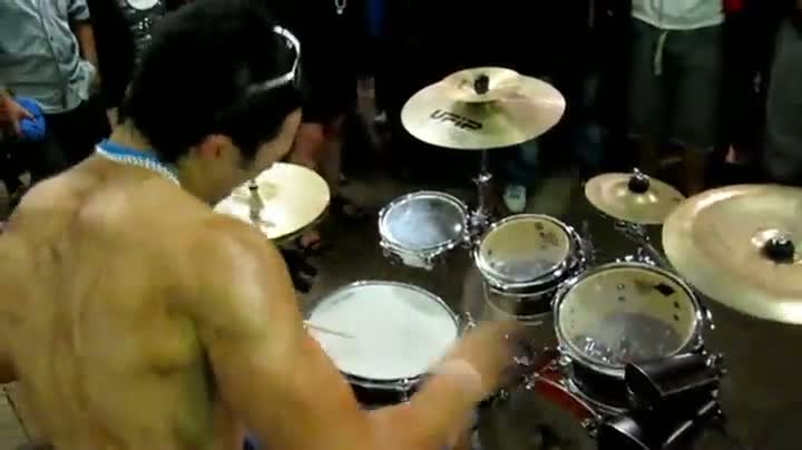 Watch Drummer's Amazing Stick Tricks Video