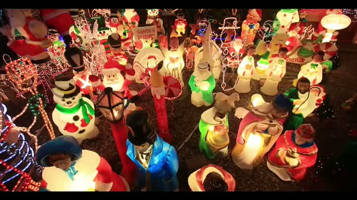 Watch A Son's Gift: 180,000 Light Christmas House Video