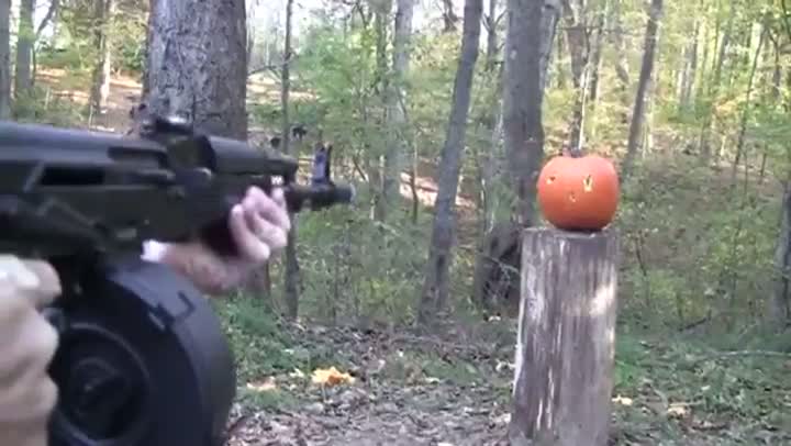 Watch Pumpkin-Carving with a Drum-Fed AK Video