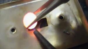 Watch What Happens When You Drop Hot Nickel Into Water? Video