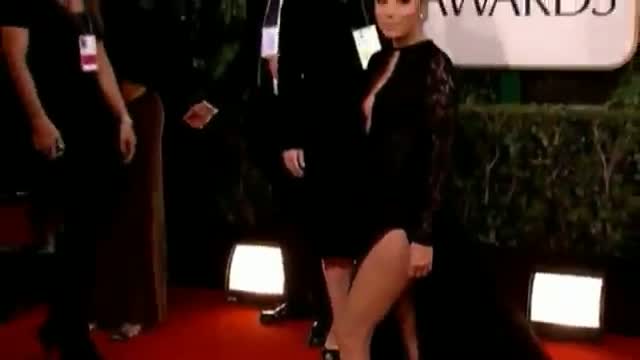 Watch Golden Globes: Eva Longoria does an Angelina Jolie and shows off bare leg on red carpet Video