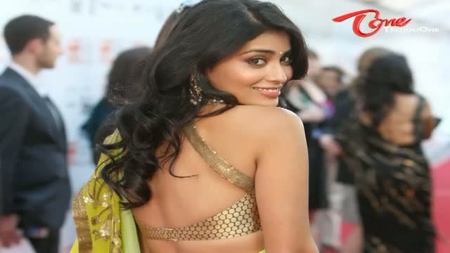 Watch Shriya Saran Spicy Hot Bare Back Photos Video