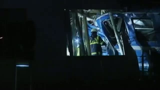 Watch Train crash: Cleaner crashes stolen train into Stockholm apartment building Video