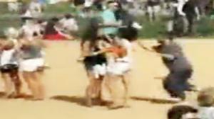 Watch Drunk Guy Shoves Chicks at Festival Video