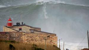 Watch Surfer Garrett McNamara Rides The Biggest Wave EVER! Video