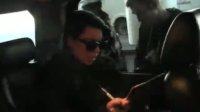 Watch Kim Kardashian Covers Up Baby Bump In Fur At LAX, Asked About Marrying Kanye Video