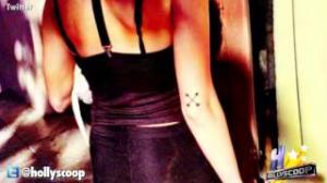 Watch Miley Cyrus' New Tattoo: What It Means Video