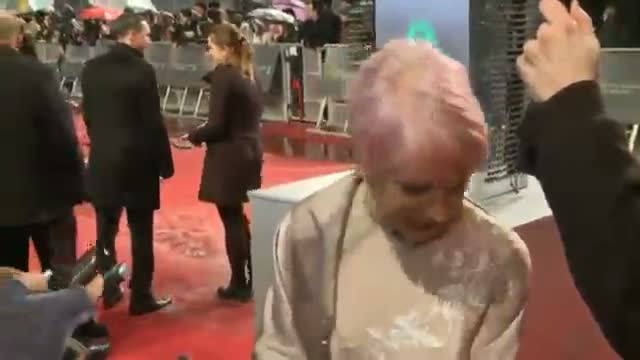 Watch BAFTAs 2013: Helen Mirren tells us why she died her hair pink on the BAFTA Awards red carpet Video