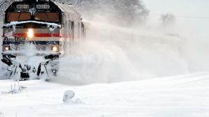 Watch Guy Gets Owned As Train Plows Through Snow Video
