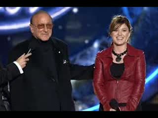 Watch Kelly Clarkson Slams Clive Davis Over 'False Information' in Memoir [Watch This] Video