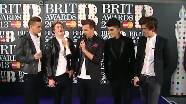Watch Brit Awards: One Direction celebrate Global Success Award in the winner's room Video