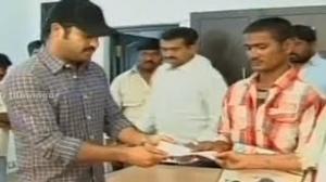 Watch Jr NTR Donating Cheque To Raju's Family - Raju Died At Baadshah Audio Launch - Telugu Cinema Movies Video