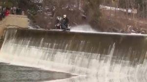 Watch Crazy Snowmobile Dam Jump Video