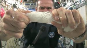 Watch Wringing Out A Wet Washcloth In Space Video