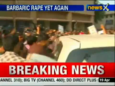 Watch Delhi Rape Case: ACP Ahlawat slaps women protestor, suspended Video