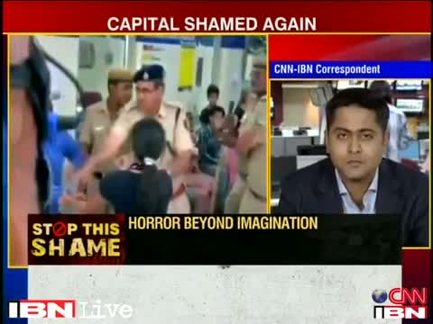 Watch Delhi Rape Case: Police officer suspended for slapping woman protester Video