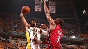Watch NBA: Paul George's POSTERIZING dunk on Bosh! Video