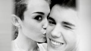 Watch Bieber & Miley Caught Flirting With Each Other Video