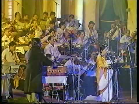 Watch Lata Mangeshkar - Aayega Aanewala / Naina Barse Rhim Jhim (Live Performance) Video