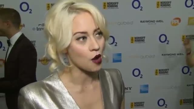 Watch Kimberly Wyatt offers men dance tips at the Nordoff Robbins Silver Clef Awards Video