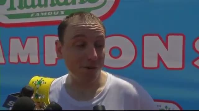 Watch Chestnut Breaks Record at Hot Dog Eating Contest Video