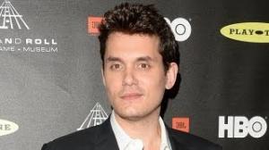 Watch JOHN MAYER Shocks a Fan, Buys Her a Guitar! Video