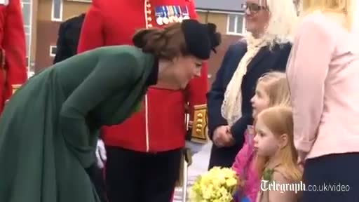 Watch Kate Middleton presents shamrock to Army Dog Video