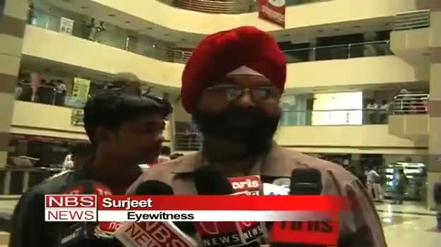 Watch Girl falls on a guard from 12th story of Mall, dies Yahoo! News Video