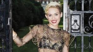 Watch Miley Cyrus Gets Sheer and $exy Video
