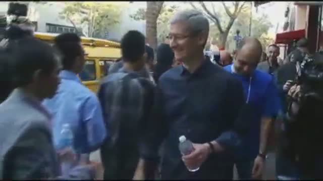 Watch Apple CEO Tim Cook Surprises iPhone Crowd Video