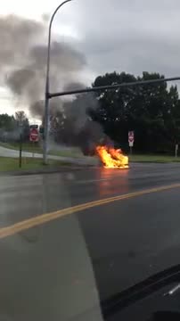 Watch Tesla Car on Fire - Caught on Tape Video