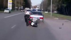 Watch Biker Crashes Into Police Car Video