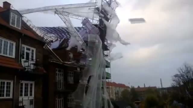 Watch Storm Rips Scaffolding From Building Video