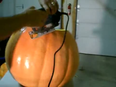 Watch Carving my Giant Pumpkin with a Black and Decker Jigsaw - Power Tools Pumpkin Carving Video
