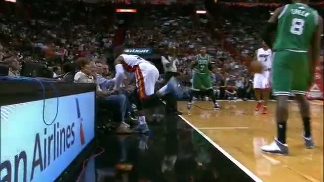 Watch NBA: Dwyane Wade Crashes Into Lady On Sideline Video