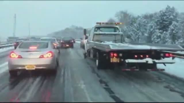 Watch East Coast Storm Dumps Snow, Snarls Traffic Video